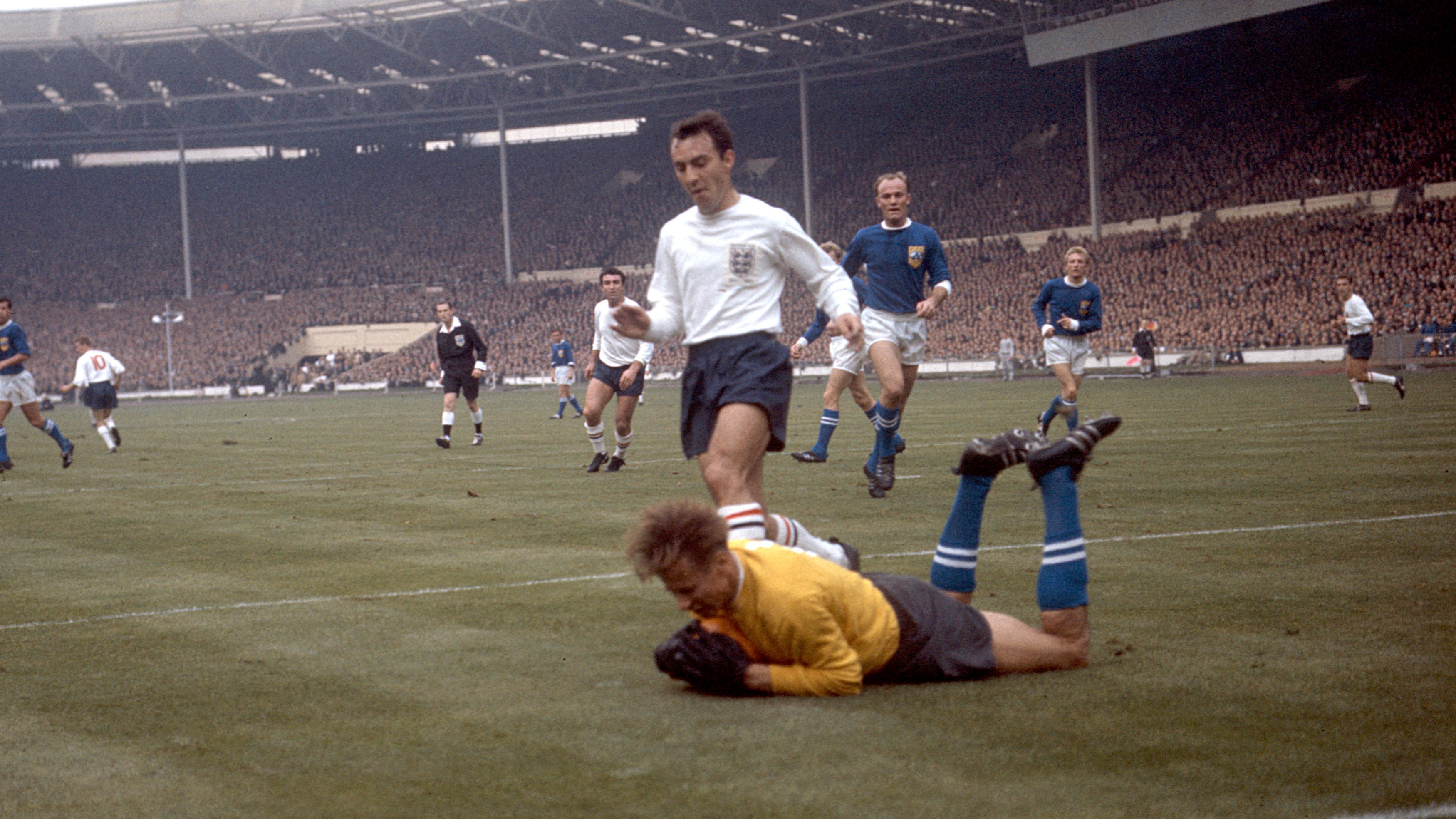 Fiifa goalkeeper Yashin (Russia), saves at the feet of England's Jimmy Greaves in 1963