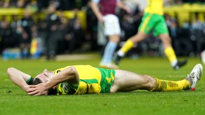 A depleted Norwich City team were beaten 2-0 by Aston Villa on Tuesday.