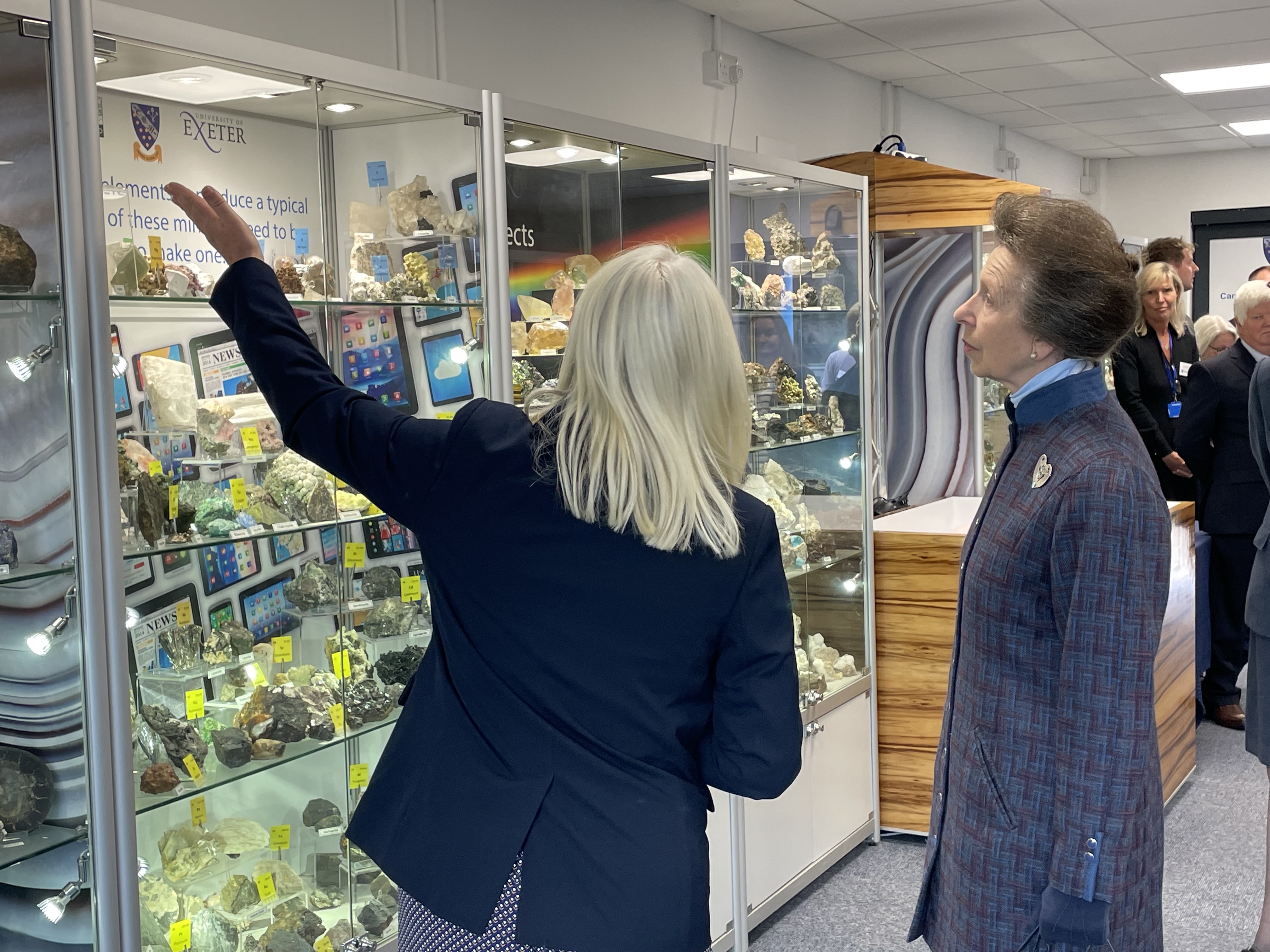 image of Frances Wall and Princess Anne looking at a geology display
