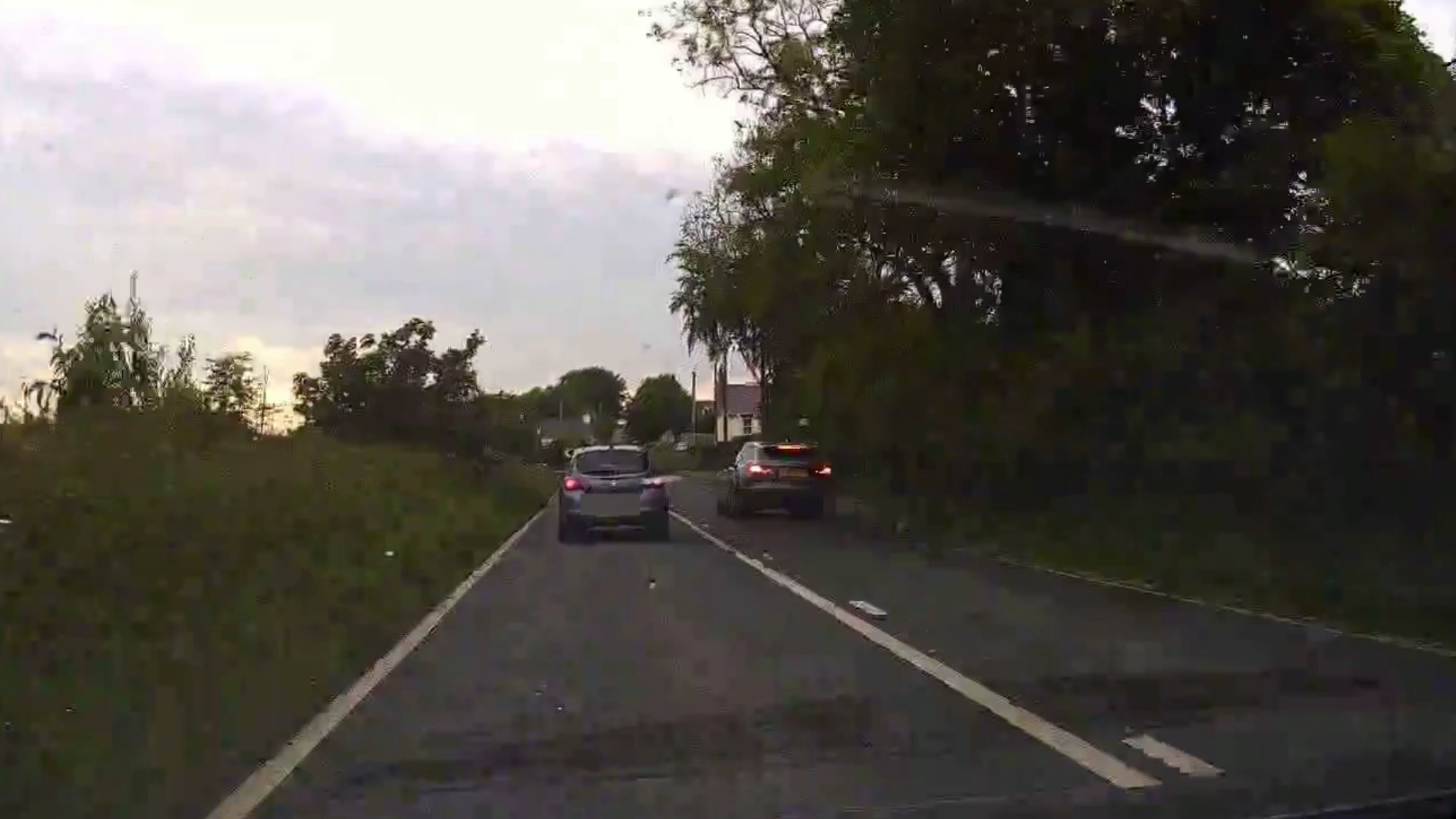 Driver narrowly avoids headoncrash after overtaking three cars on