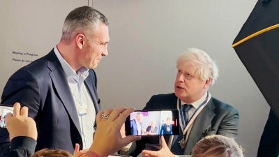 Boris Johnson receiving an honorary "Citizen of Kyiv" medal from the city's Mayor, Vitali Klitschko, at the World Economic Forum.