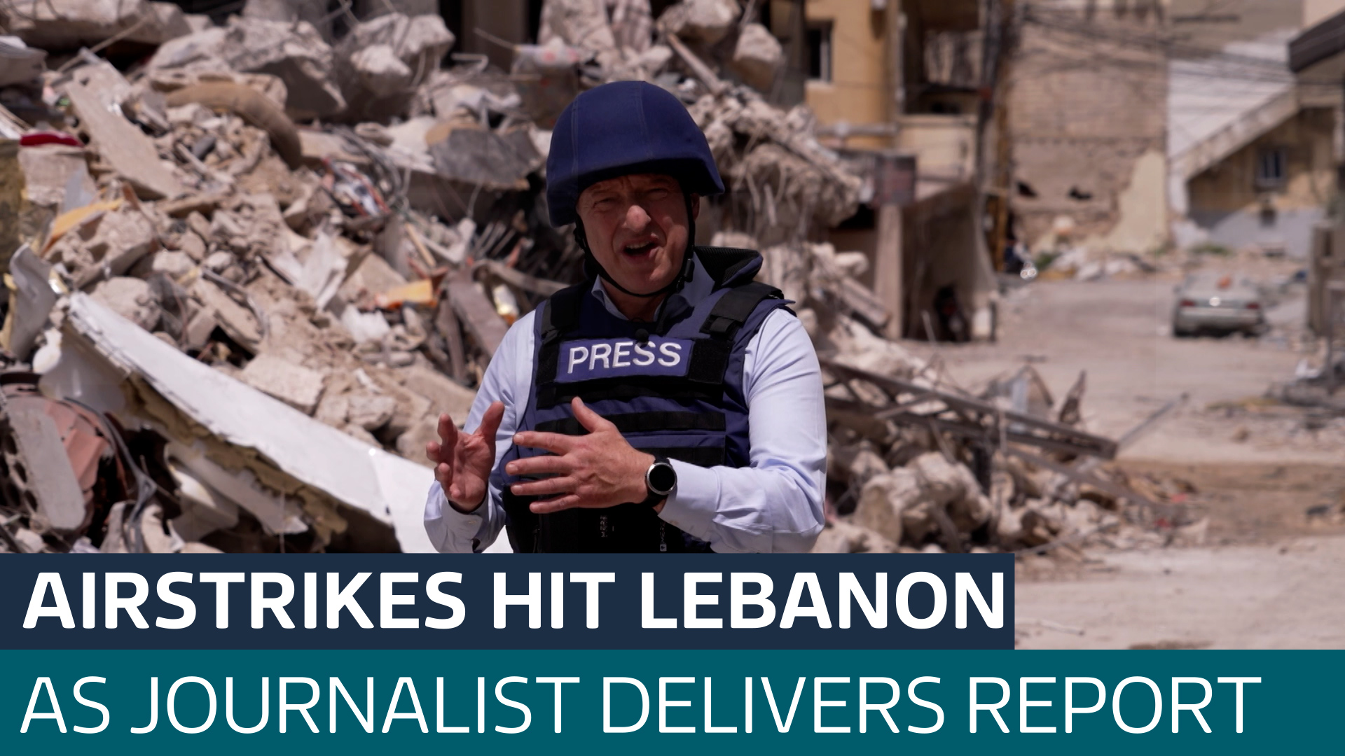 Watch as sound of airstrike interrupts our correspondent's report from southern Lebanon - Latest From ITV News