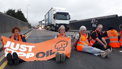 Just Stop Oil protesters blocked the road to the Navigator oil terminal in Thurrock, Essex.
Credit: Just Stop Oil