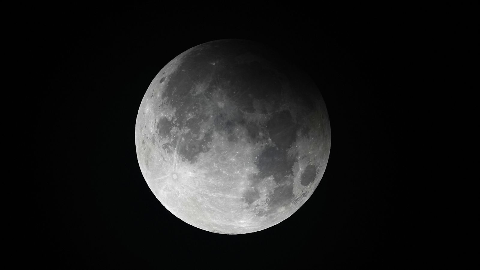 Rare supermoon and lunar eclipse lit up UK skies overnight