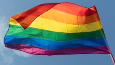A Pride flag afloat in celebration of the event.