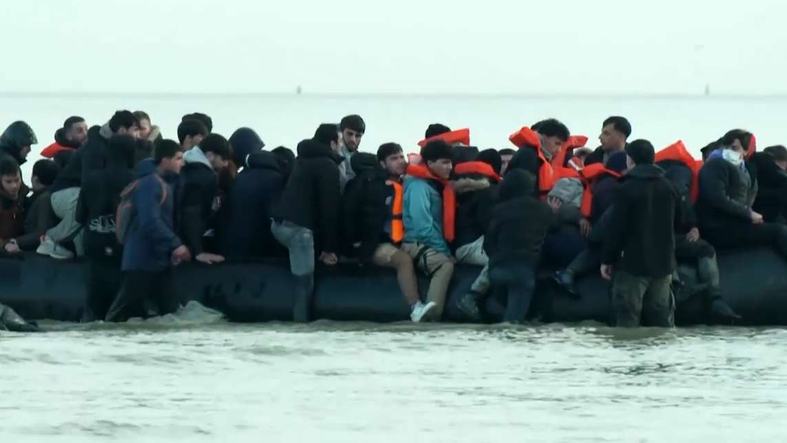 Undeterred and uninterrupted: French police watch on as migrants cross Channel