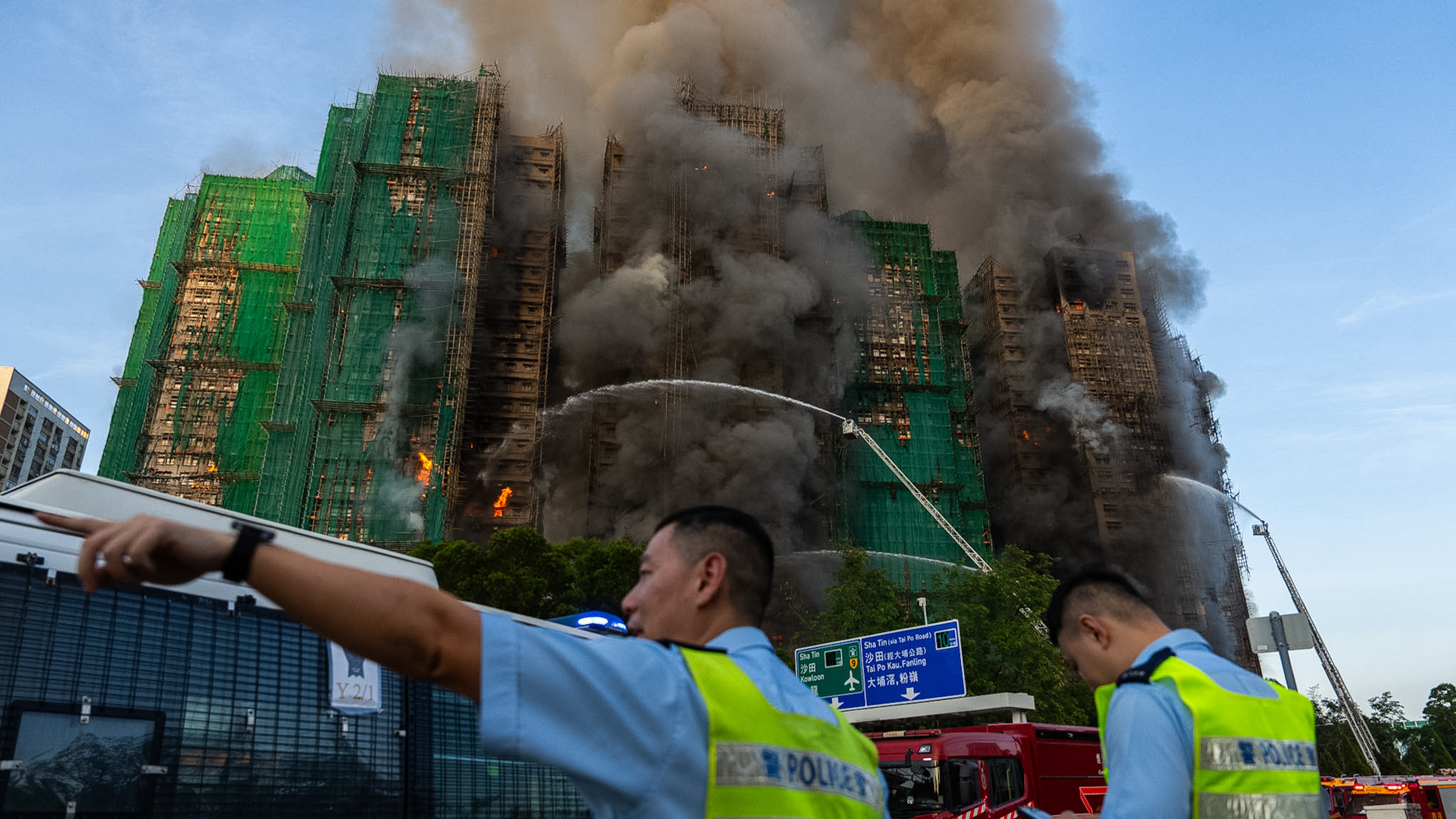At least four people die as large fire breaks out in Hong Kong apartment block