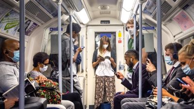 Passengers wearing face masks on the Jubilee Line in London, as workers are being encouraged to return to their offices, with a Government PR blitz commencing this week reminding people about the efforts taken to make workplaces "Covid-secure".