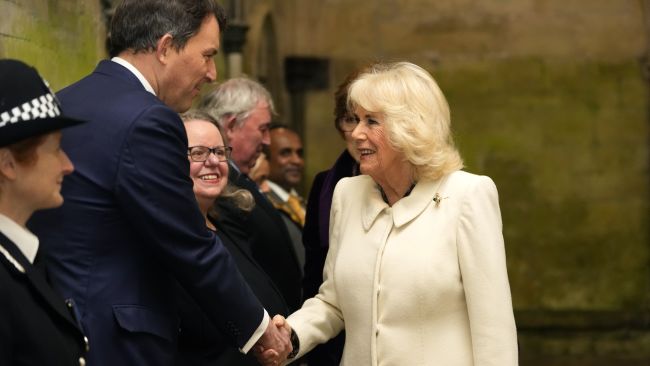 Queen Camilla shakes hands with John Glen as she arrives to attend a musical evening at Salisbury Cathedral in Wiltshire, to celebrate the work of local charities including the Wiltshire Bobby Van Trust, Wiltshire Air Ambulance, and Community First - Youth Action Wiltshire, as well as the regimental charities of the Grenadier Guards and The Rifles. Picture date: Thursday February 8, 2024.