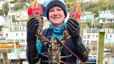 Giant lobster with fishmonger