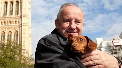 Laurence Robertson MP for Tewkesbury with his Dachshund, Sausage