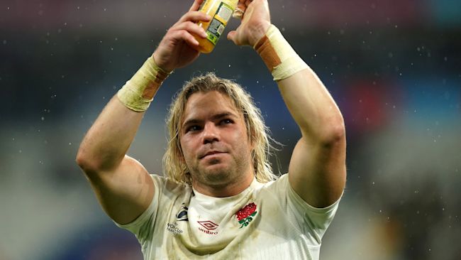South Africa's Faf De Klerk applauding the crowd after swapping shirts with England's Danny Care.