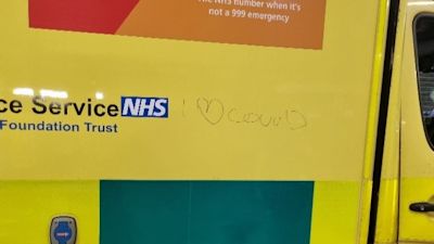 "I 'heart' Covid" was marked onto the side of the ambulance