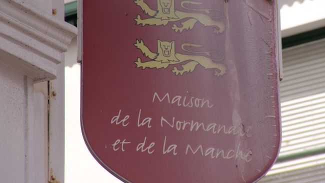 The sign for Maison de la Normandie et de la manche.