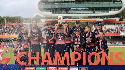 England celebrate with the trophy during the ICC Women's World Cup Final at Lord's