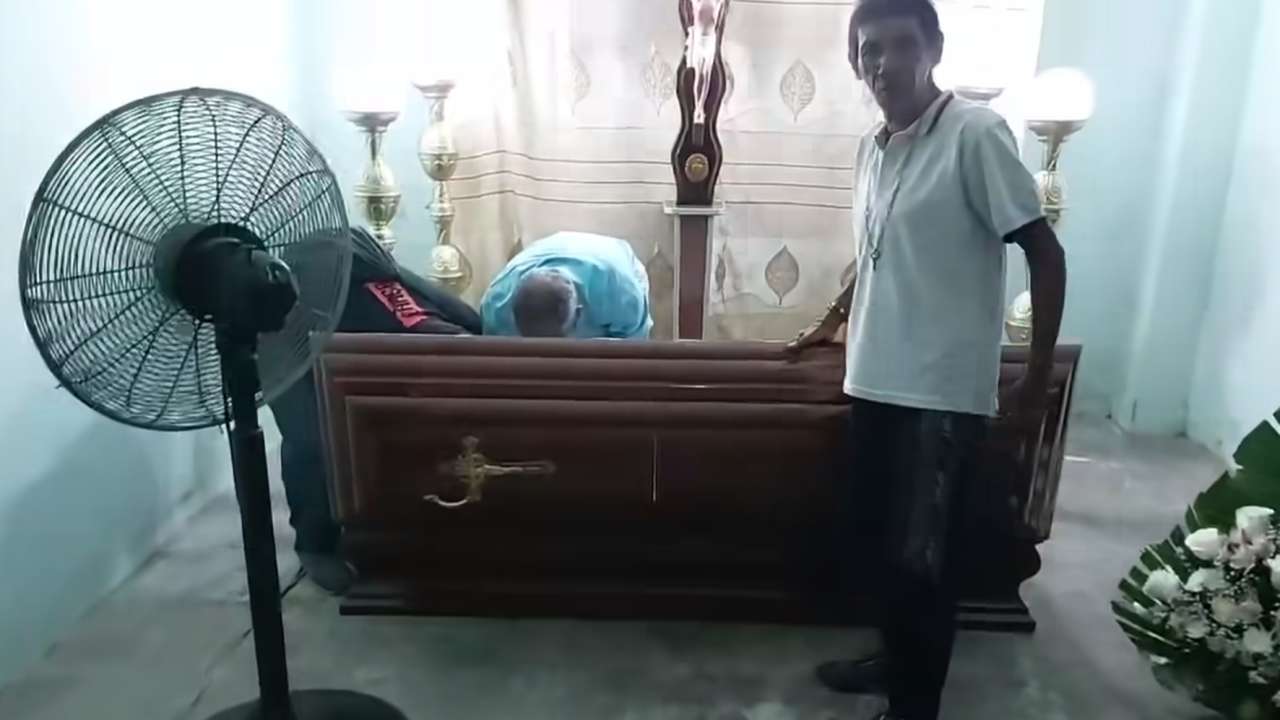 'Dead' woman knocks on coffin shocking wake guests