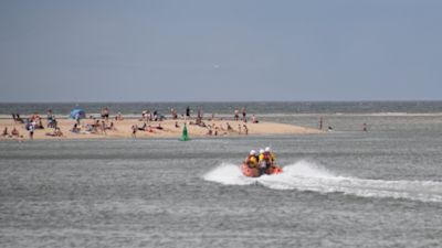 The RNLI had to rescue 40 people at the weekend who had got cut off from the mainland after rising tides near to Wells in north Norfolk. Credit: RNLI Wells/Facebook