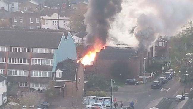 A woman has died after a huge fire destroyed a house in West London, prompting emergency services to close roads in Hounslow.

Two other women were injured in the blaze and emergency services are trying to establish the cause.

The fire started at a home on Netley Road, just off Ealing Road, Brentford at 4.03pm this afternoon, and it took over more than two hours for the fire brigade to put it out. Around 65 firefighters were on the scene dealing with the blaze and eight fire engines were in attendance.

A spokesperson for the Metropolitan Police said: "Officers were called at about 4.05pm on Sunday, November 13 to reports of a fire inside a flat on Netley Road in Brentford. Emergency services are in attendance.

"Three people were treated by the London Ambulance Service. Despite the efforts of paramedics, one person was pronounced dead at the scene. The other two people have been taken to hospital; we await an update on their condition. A number of neighbouring properties have been evacuated."

A spokesperson from the London Fire Brigade said: "The house is was a two-floor building and was severely damaged. One woman left before fire services arrived and was taken to hospital.

"Another woman was rescued from the first-floor bedroom by firefighters in breathing apparatus and was taken to the hospital. The fire was under control by 6.39pm, the cause of the fire is under investigation."