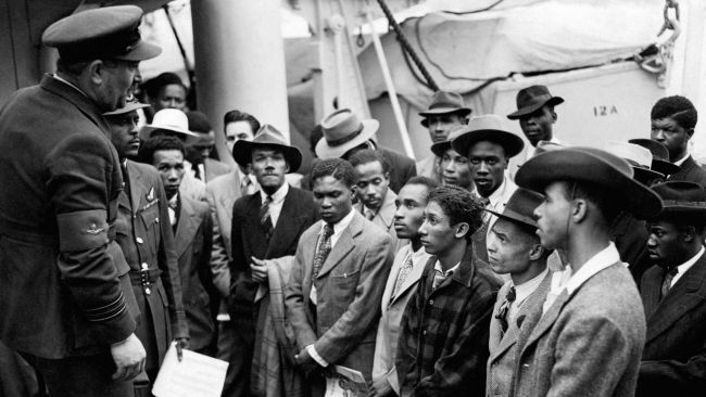 EMBARGOED TO 0001 TUESDAY JANUARY 3 File photo dated 22/06/48 of Jamaican immigrants welcomed by RAF officials from the Colonial Office after the ex-troopship HMT 'Empire Windrush' landed them at Tilbury. The 75th anniversary of the Windrush generation who helped rebuild post-war Britain will be marked later this year as a "diamond jubilee for modern, diverse Britain", campaigners have said. The Windrush 75 network of national organisations, including British Future charity, which aims to advance racial and cultural harmony in the UK through education, is co-ordinating events to celebrate the historic milestone. Issue date: Tuesday January 3, 2023.


