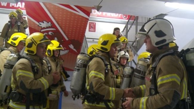 Firefighters completing the charity challenge in Bristol.