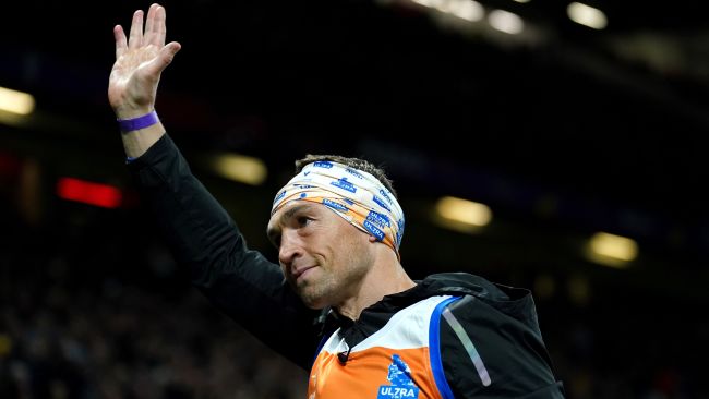 Kevin Sinfield applauds the crowd following the end of his Ultra 7 in 7 Challenge from Bradford City to Old Trafford during the Rugby League World Cup final at Old Trafford, Manchester. Saturday November 19, 2022.