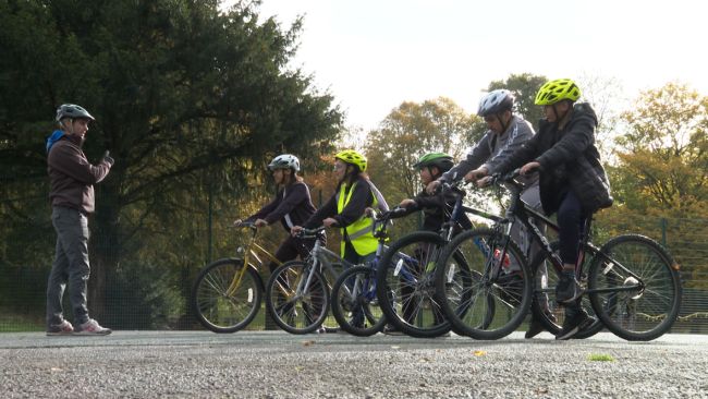 A group of people take part in a cycling session in Walsall