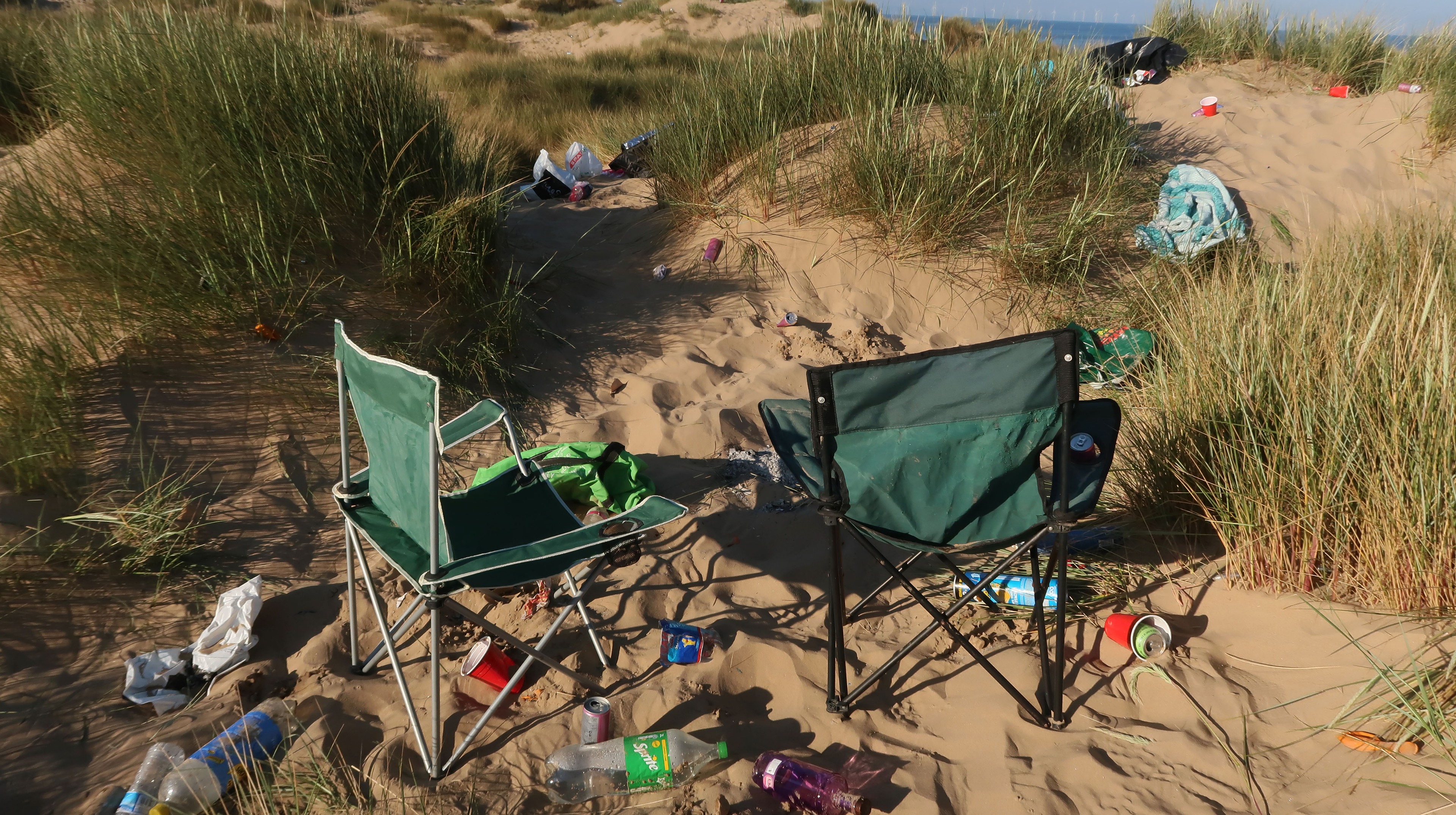 Beer Bottles Rubbish And Laughing Gas Canisters Strewn Across Formby Beach Granada Itv News