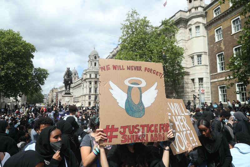 Crowds descended on Whitehall in a demonstration on the first anniversary of the death of Somalian child refugee Shukri Abdi