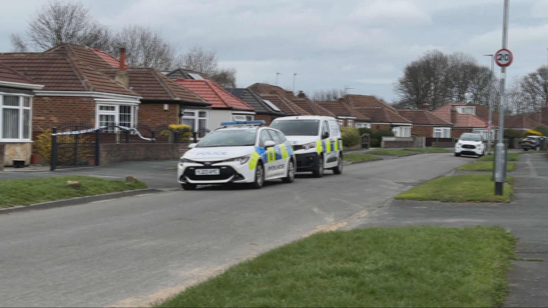 Police at the scene on Kennerleigh Avenue, Leeds, on Sunday