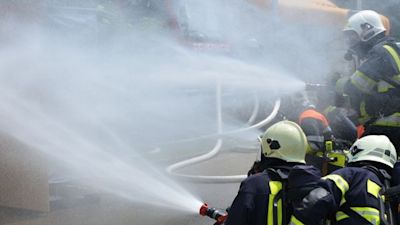 Firefighters tackling a fire that has resulted in one man going missing
