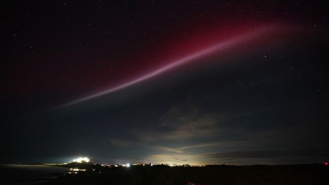A strong thermal emission velocity enhancement, a rare aurora-like phenomenon named a STEVE in 2016 by scientists in Canada, can be seen over Bamburgh castle, in Northumberland on the North East coast of England. 