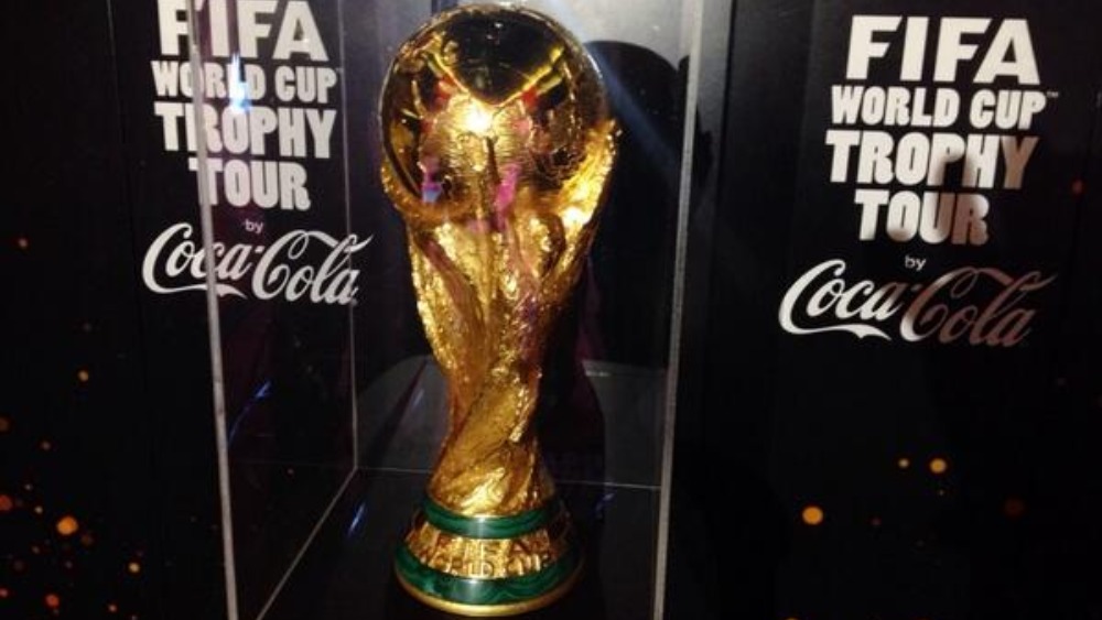 SWINDON, UK - JUNE 11, 2014: FIFA World Cup Trophy On A White