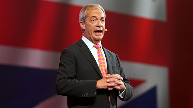 Nigel Farage delivers his keynote speech at the Reform UK conference in Birmingham.