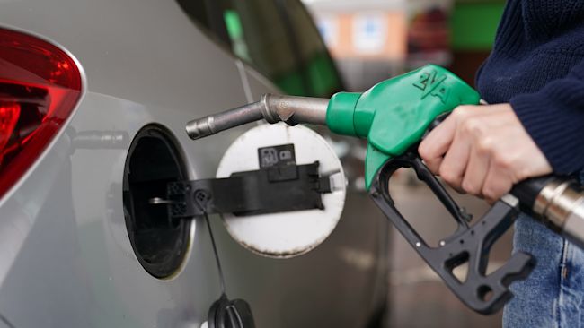 An E10 petrol pump at a Petrol Station in Kettering. A cleaner form of petrol is being introduced at filling stations across Britain from Wednesday. E10 petrol, which is made with up to 10% bioethanol - a type of renewable fuel - will be the standard offering at forecourts as part of Government plans to cut carbon emissions. Picture date: Wednesday September 1, 2021. Joe Giddens/PA