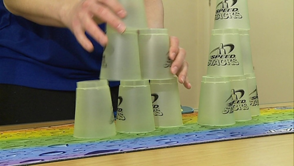 Speed stacking teenager stacks cups in under two seconds | ITV News Anglia