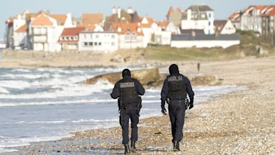 French police officers patrol the beaches in Wimereux near Calais as migrants continue to launch small boats along the coastline in a bid to cross the Channel towards the UK. Picture date: Thursday November 18, 2021.