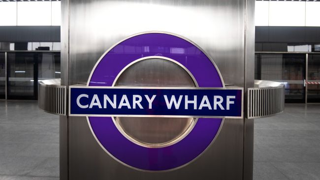 Canary Wharf signage in place on the platform of the new Elizabeth Line at Canary Wharf station
