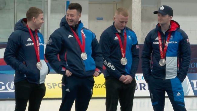 26/01/22. The Team GB men's curling squad in Dumfries with their silver medals. ITV Border