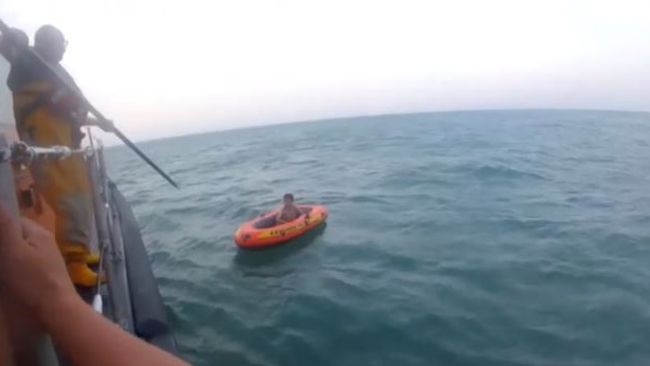 RNLI rescue boy on inflatable dinghy after he is blown a mile out to sea.
RNLI