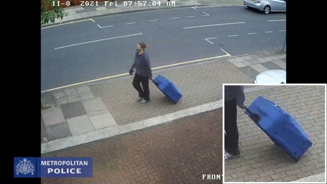 Jemma Mitchell seen wheeling a suitcase along the street