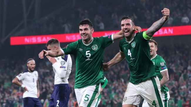 Republic of Ireland's John Egan (left) and Shane Duffy celebrates the own goal of Serbia's Nikola Milenkovic (not pictured) during the 2022 FIFA World Cup Qualifying match at Aviva Stadium, Dublin. 
Picture date: Tuesday September 7, 2021.
Picture by: Niall Carson / PA Images
