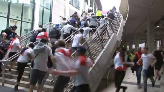 Fans breach security, rush past stewards and up stairs at Wembley