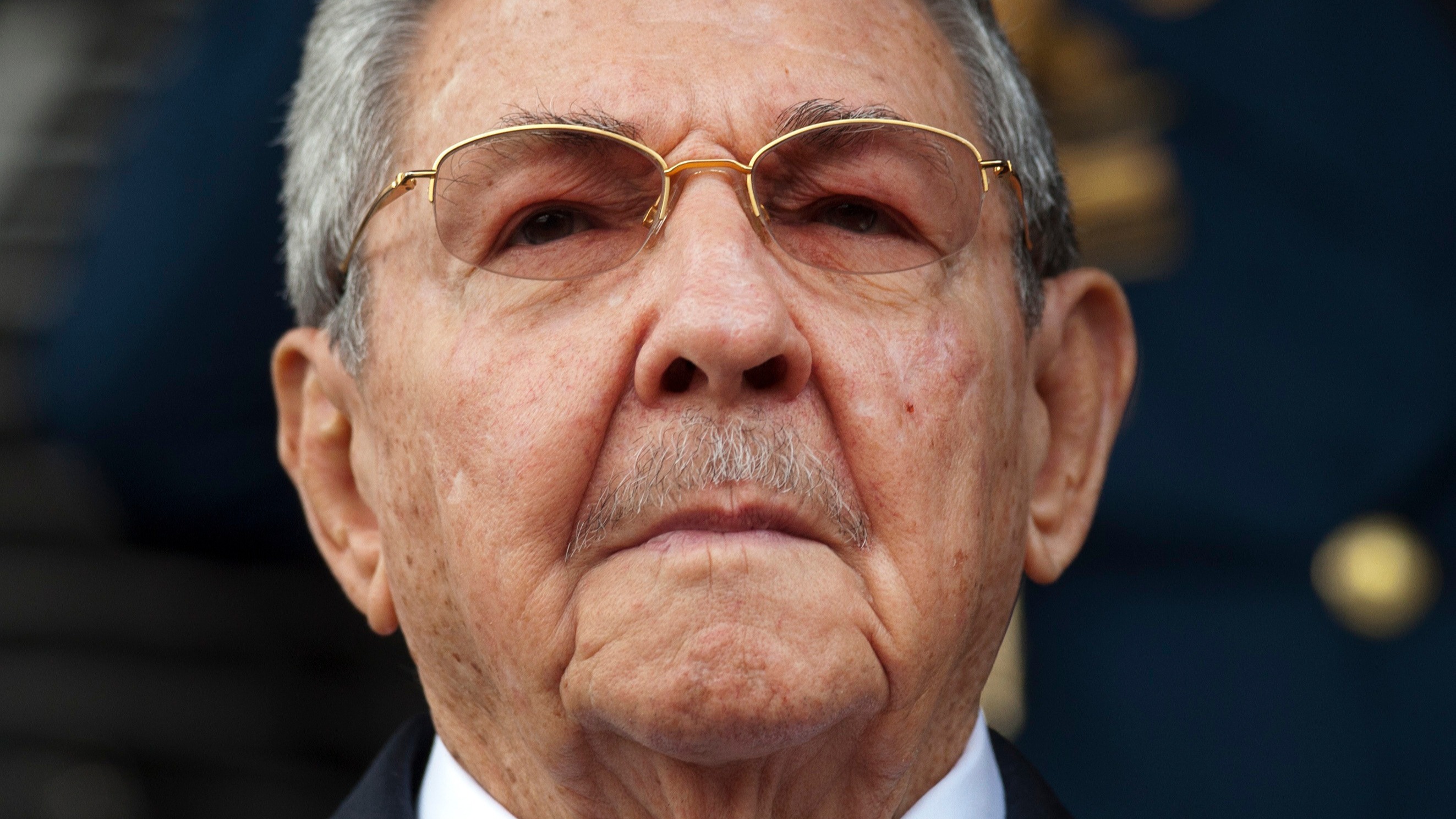 Cuba's President Raul Castro listens to the Cuban and Venezuelan national anthems during his welcome ceremony at the Miraflores presidential palace, March 17, 2015, in Caracas, Venezuela. 