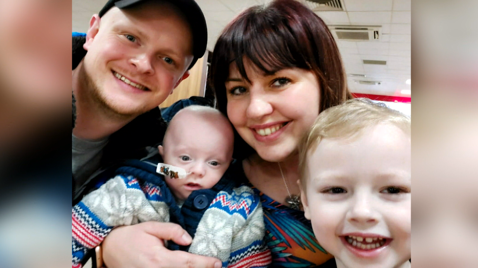 Baby a white black having people