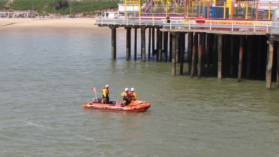 An RNLI lifeboat searches for the missing swimmer at Clacton