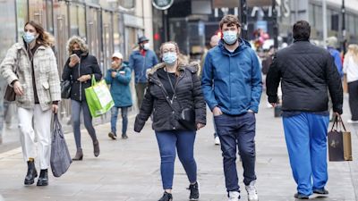 People wearing masks in street Covid PA