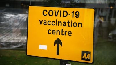 Walk in vaccination sign