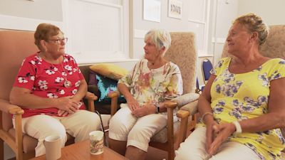 Three female sitters for a dementia charity