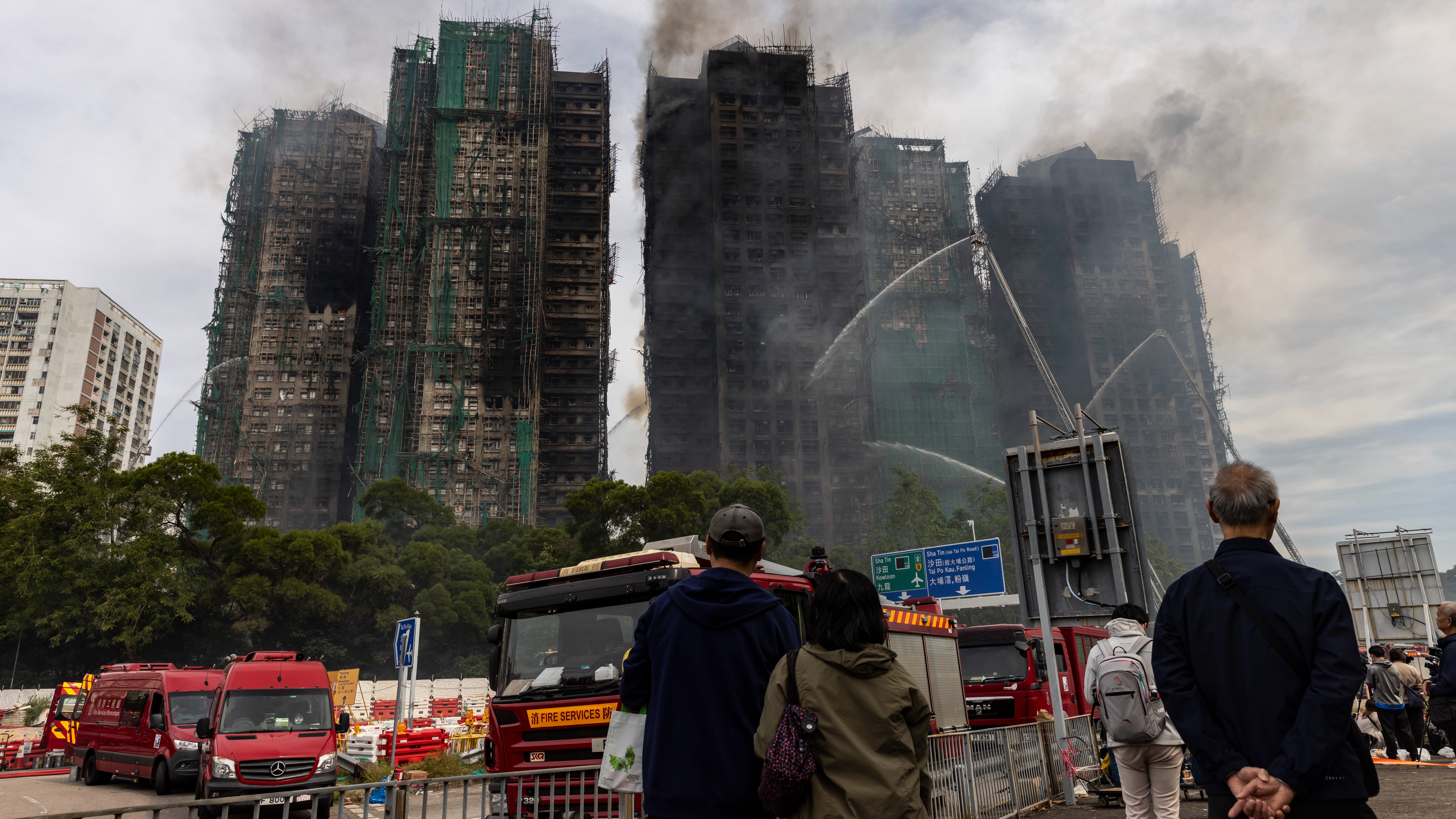 Search continues for hundreds lost in Hong Kong tower fire as dozens killed