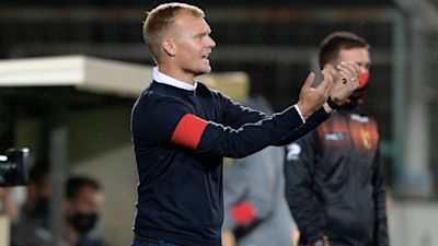 Liam Manning has been coaching in Belgium.